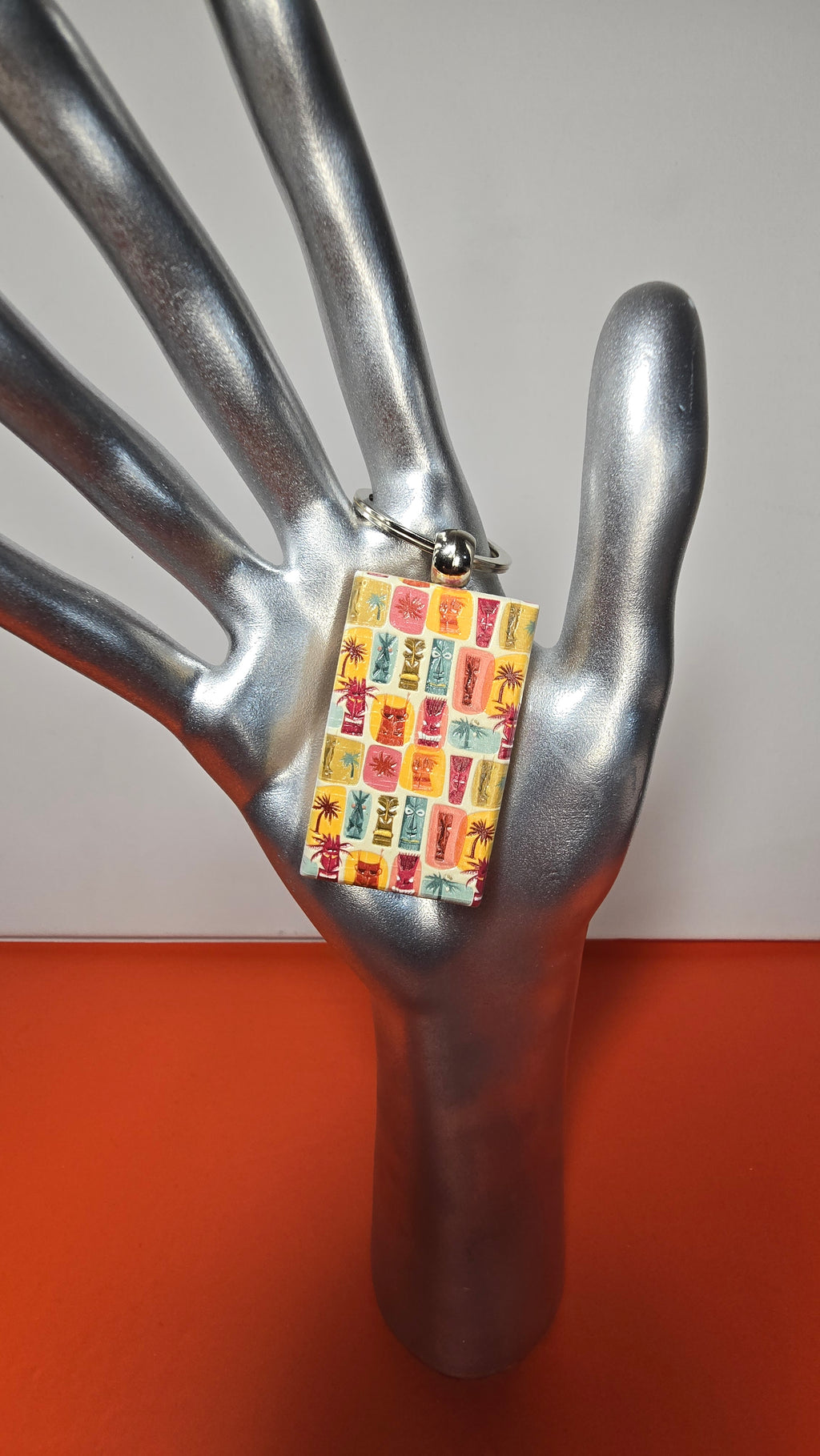 Tiki Faces & Palms Grid Raised Texture Wood Keychain