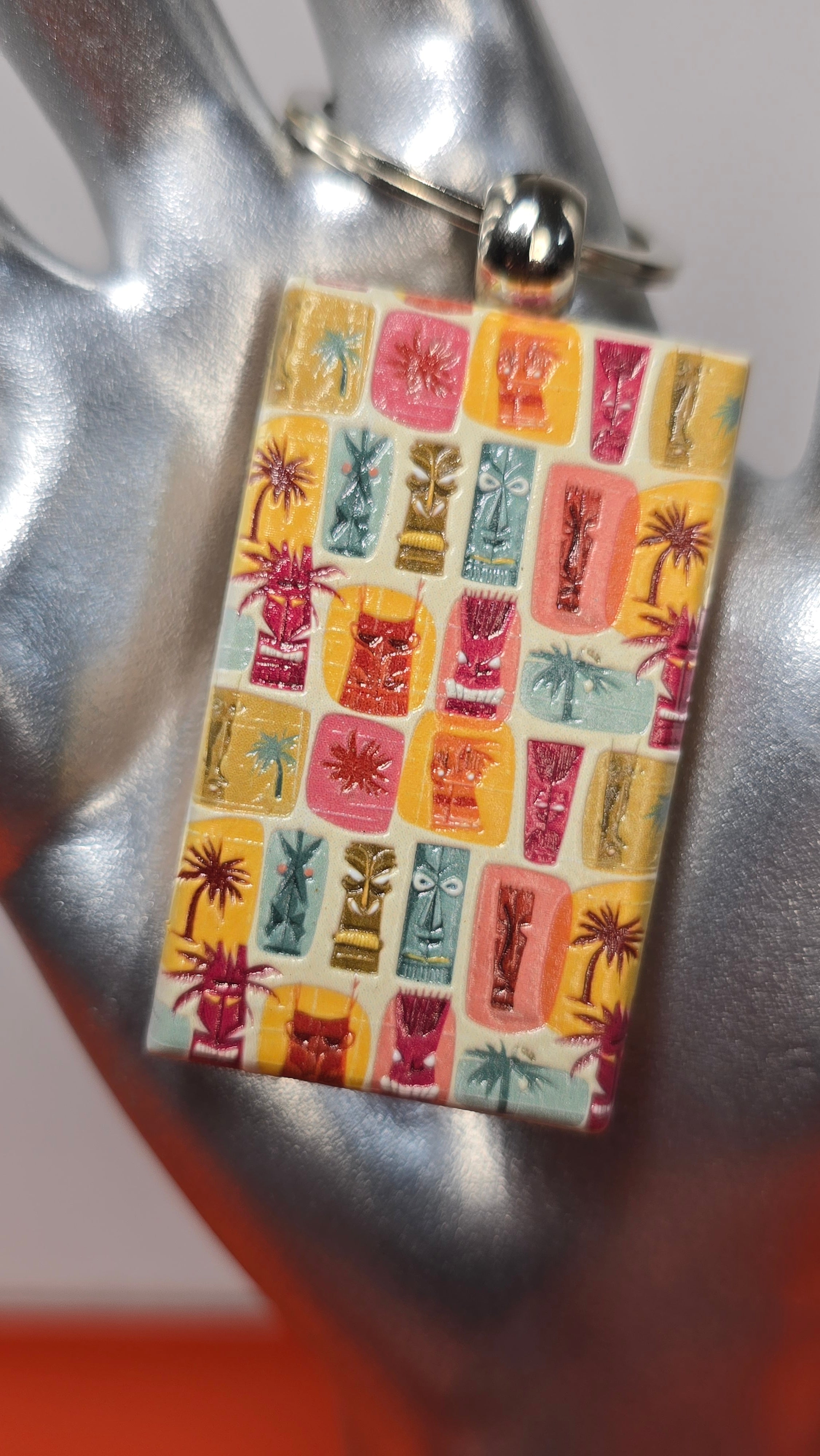 Tiki Faces & Palms Grid Raised Texture Wood Keychain