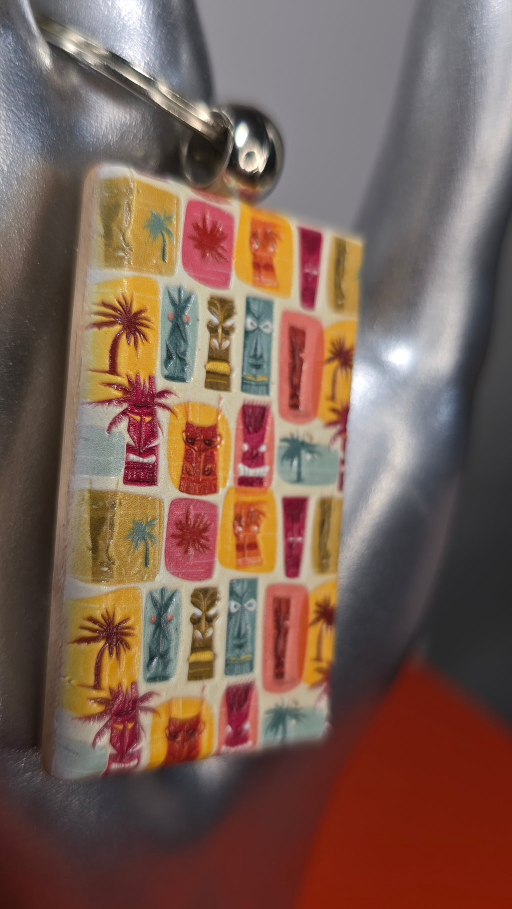 Tiki Faces & Palms Grid Raised Texture Wood Keychain