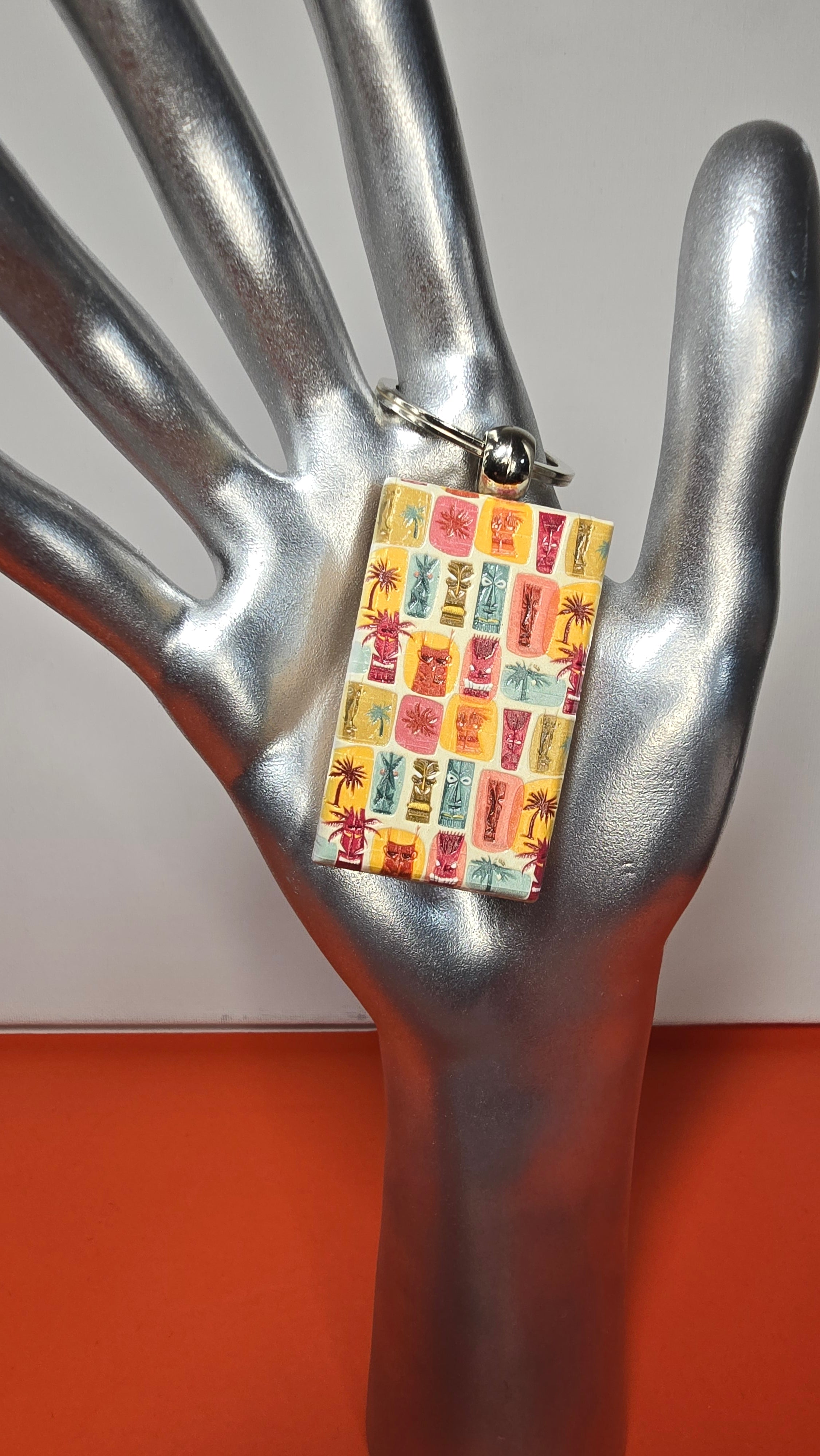 Tiki Faces & Palms Grid Raised Texture Wood Keychain